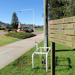 Great North Walk sign post pointing to; Newcastle Warners bay Sydney Cove and Teralba Rail (66153)